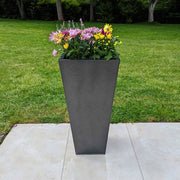 Rows of trough planters filled with vibrant flowers